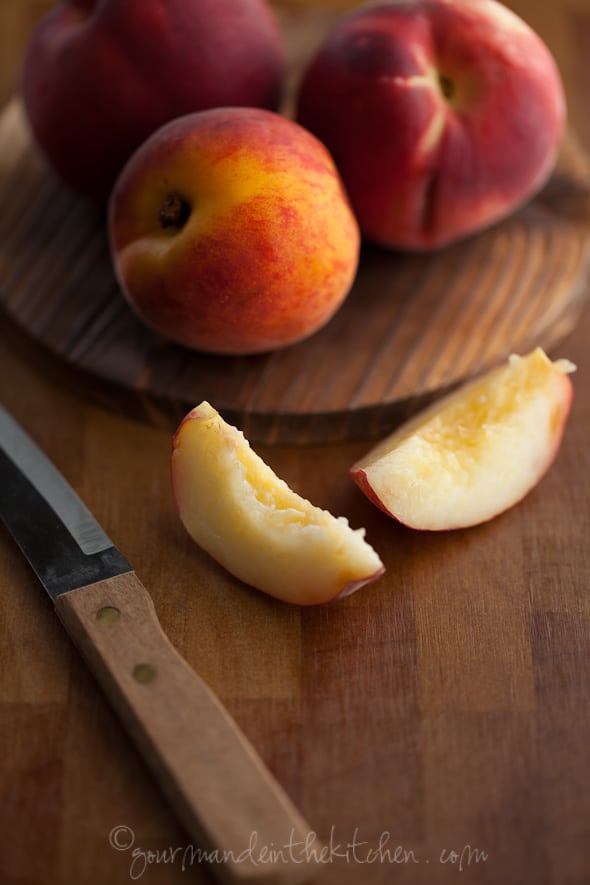 Peaches on cutting board