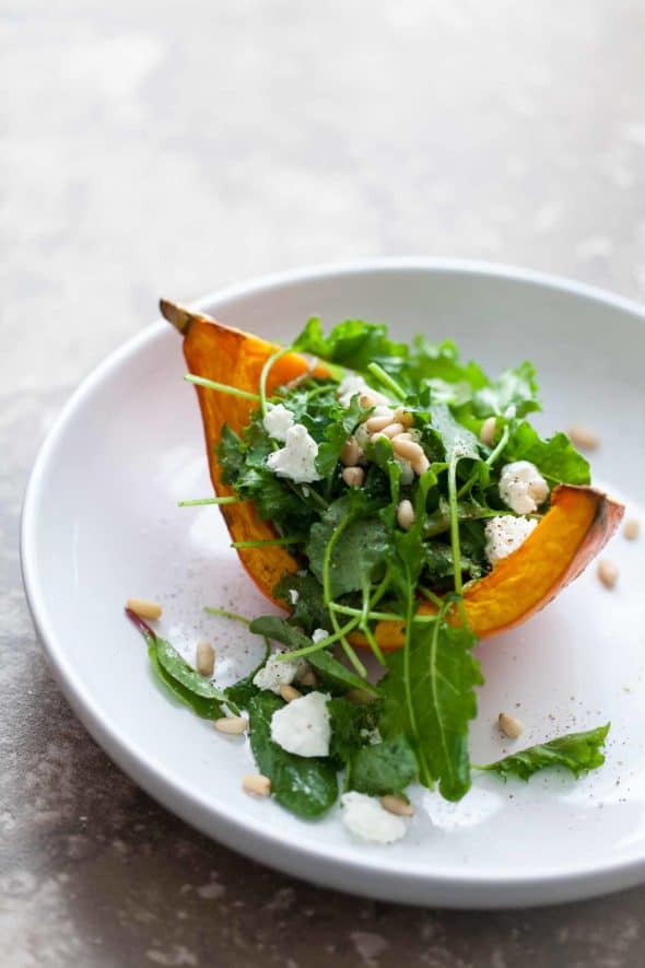 Roasted Winter Squash Salad Boats with Goat Cheese and Pine Nuts on Plate