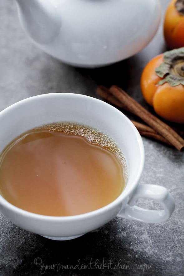 Spiced Persimmon, Ginger, Cinnamon, Turmeric Tea in Cup Side View