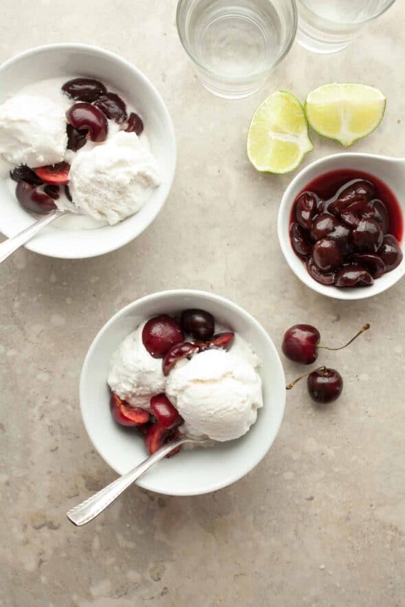 Triple Coconut Sorbet with Kirsch Soaked Cherries - With three layers of coconut from coconut milk, shredded coconut and coconut water this triple coconut sorbet is packed with flavor.With three layers of coconut from coconut milk, shredded coconut and coconut water this triple coconut sorbet is packed with flavor.