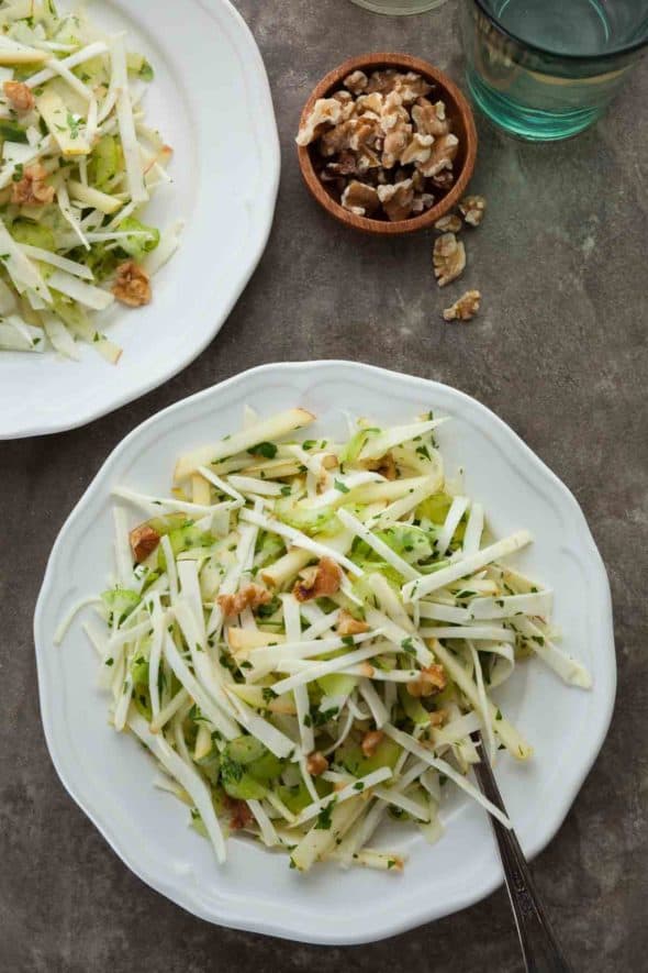 A cool and crisp salad featuring crunchy thin slices of celery root, celery and apples in a lemon-mustard vinaigrette.