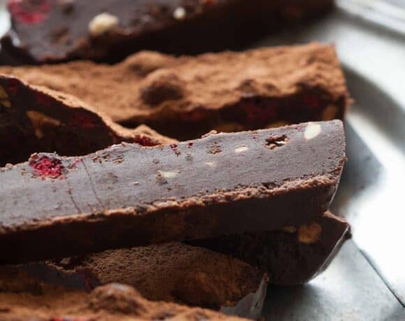 A fudgy no-bake chocolate truffle cake with raspberries and almonds that sets in the fridge and only takes minutes to make.