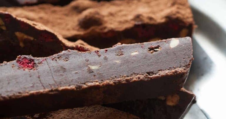 A fudgy no-bake chocolate truffle cake with raspberries and almonds that sets in the fridge and only takes minutes to make.