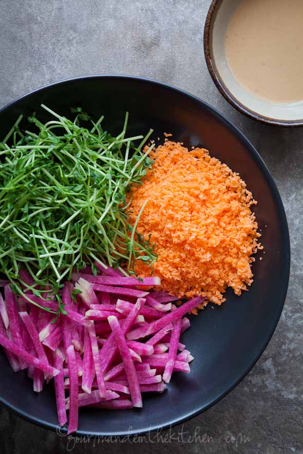 shredded carrots, pea shoots, watermelon radishes, sunflower seed butter dipping sauce