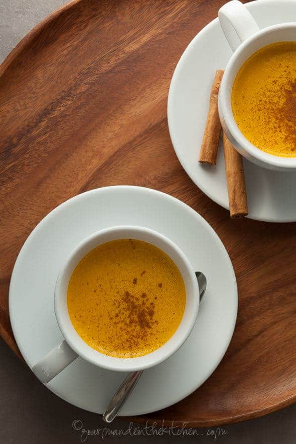 Spiced Sweet Potato Turmeric Milk in Cups on Wood Tray