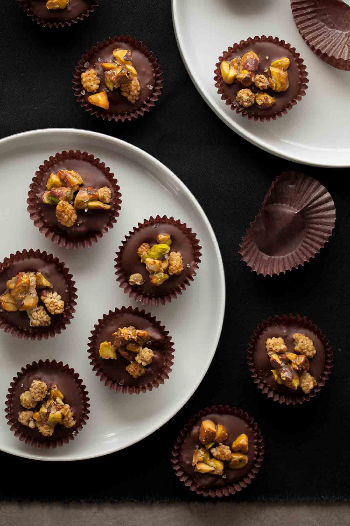 Chocolate Nut Clusters on Plates and Table