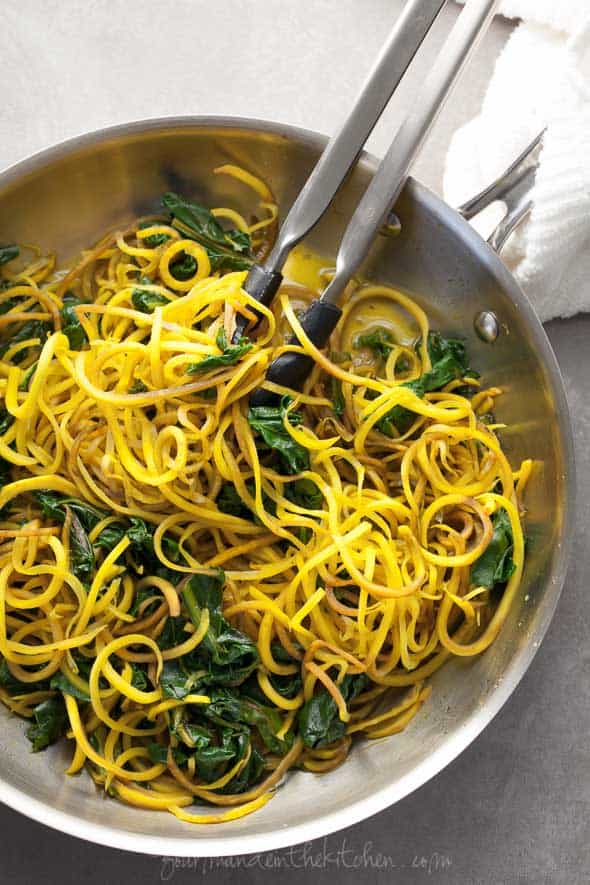 Golden Beet Noodles with Beet Greens and Cilantro Tahini Sauce in Pan