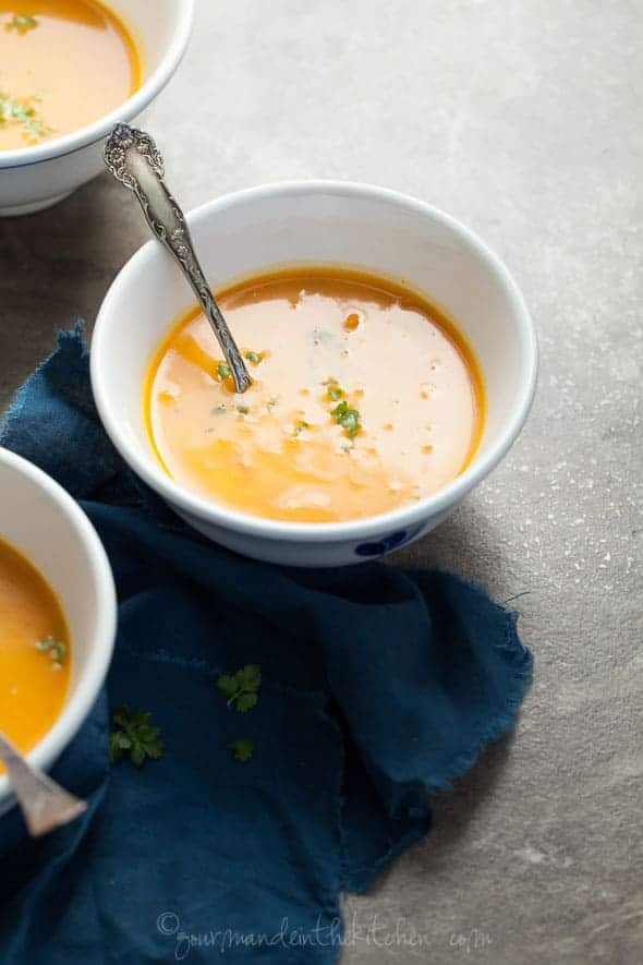 Spicy Carrot Sweet Potato Soup in Bowls with Spoon