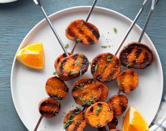 Miso-orange glazed grilled sweet potatoes cook up tender and creamy on the insides and are so much more fun than your standard baked potato on the grill.