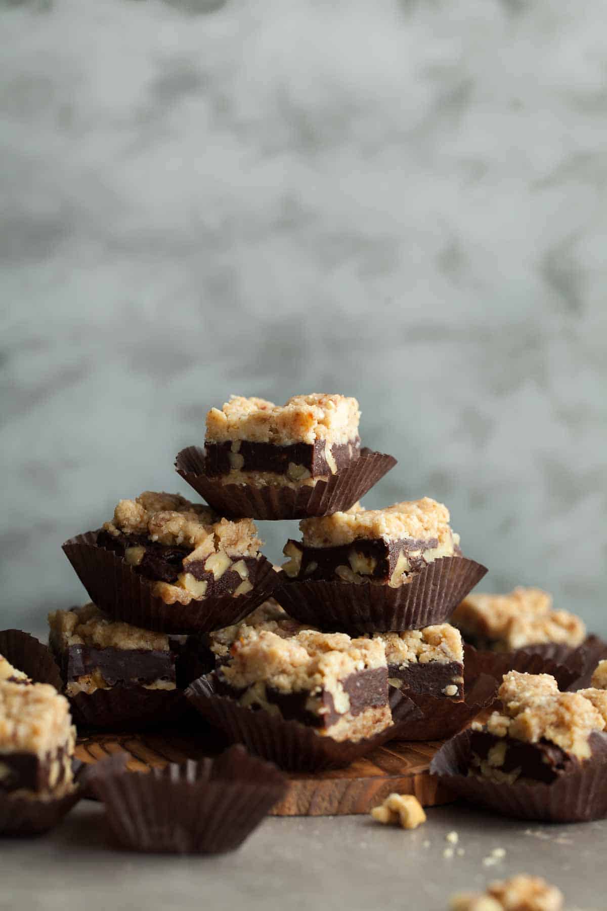 Stack of no-bake chocolate walnut crumb bars 