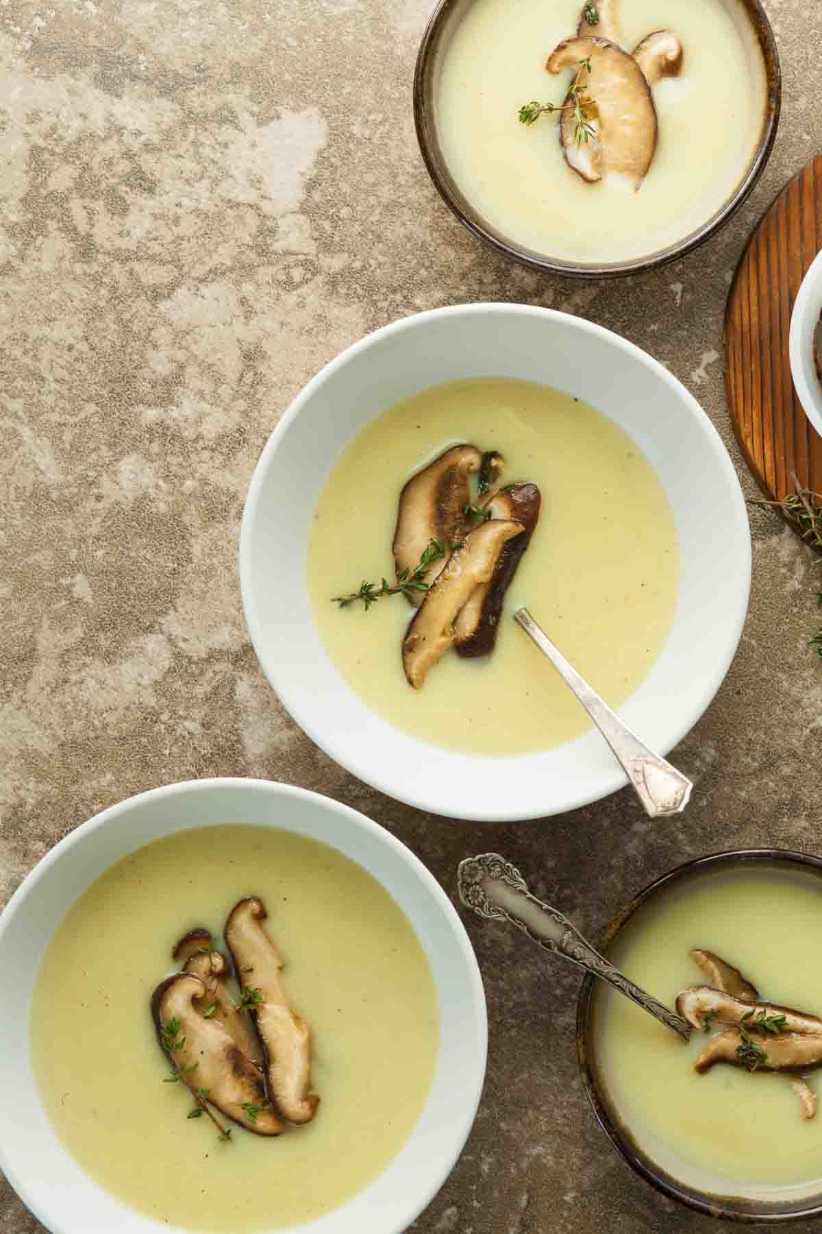 Celeriac Soup in Bowls with Spoons