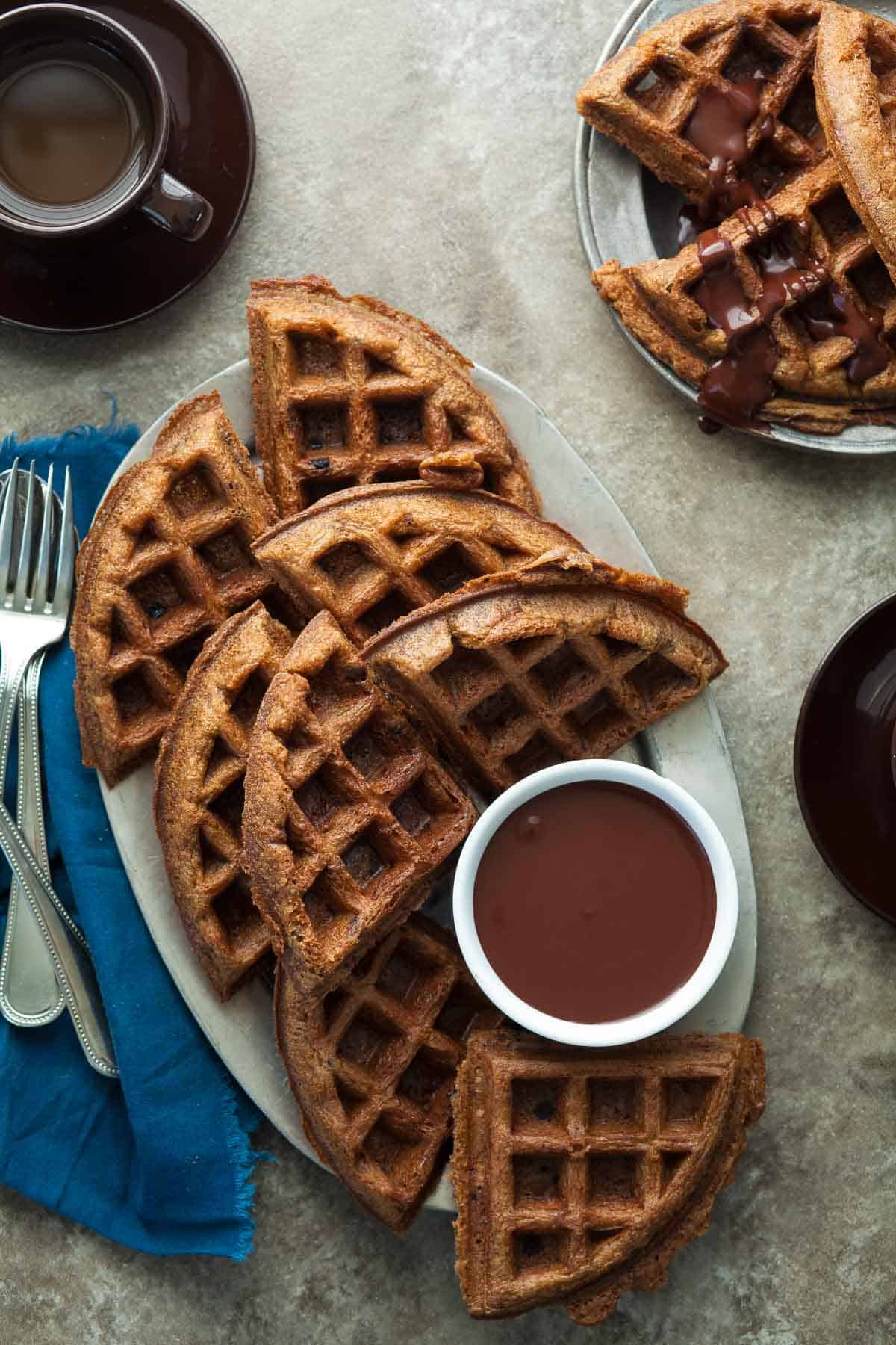 Paleo Chocolate Chip Almond Butter Waffles with Chocolate Sauce - These light and airy chocolate chip almond butter waffles with chocolate sauce come together in no time at all.