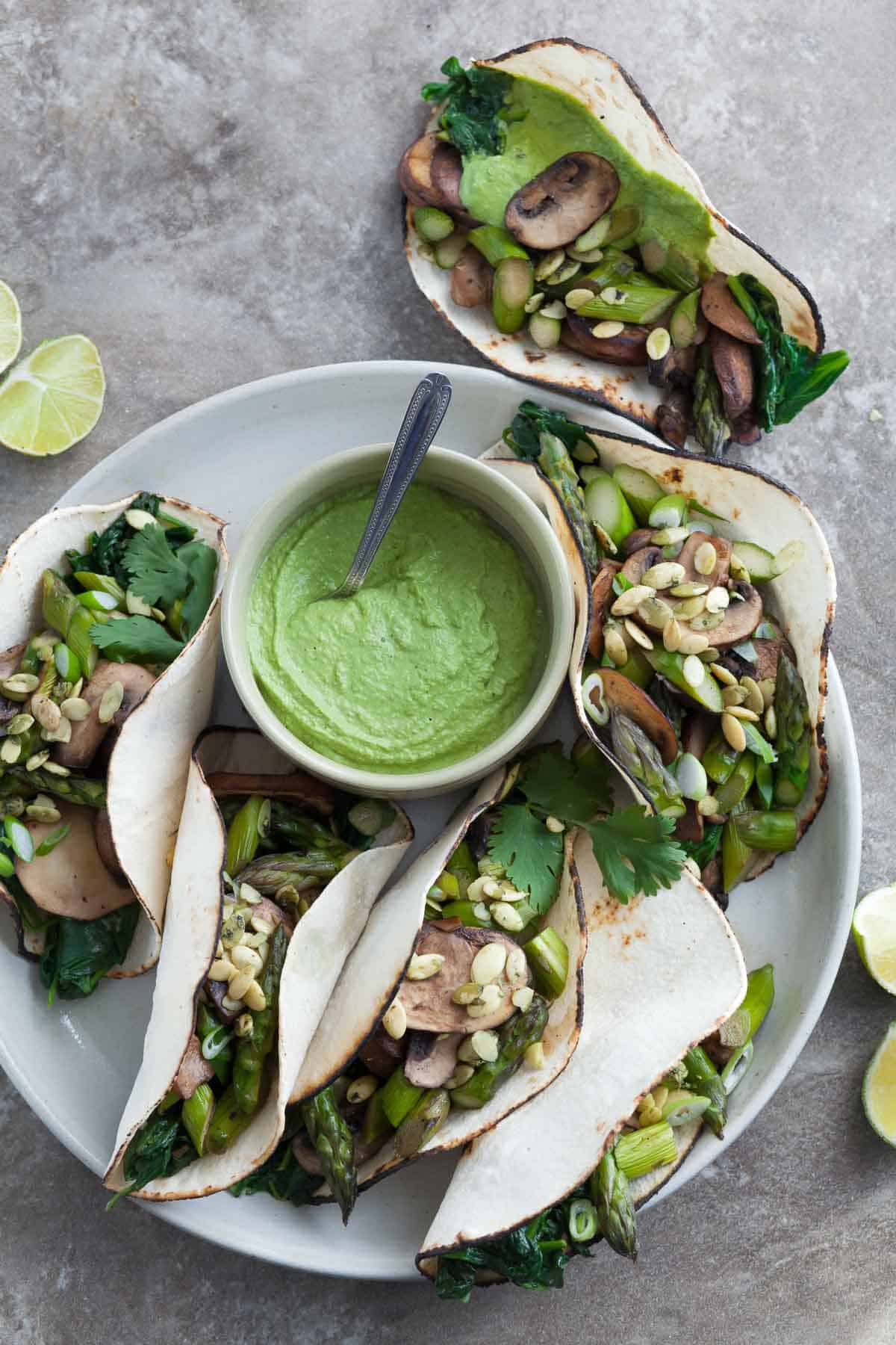 Asparagus Tacos on Plate with Lime Wedges