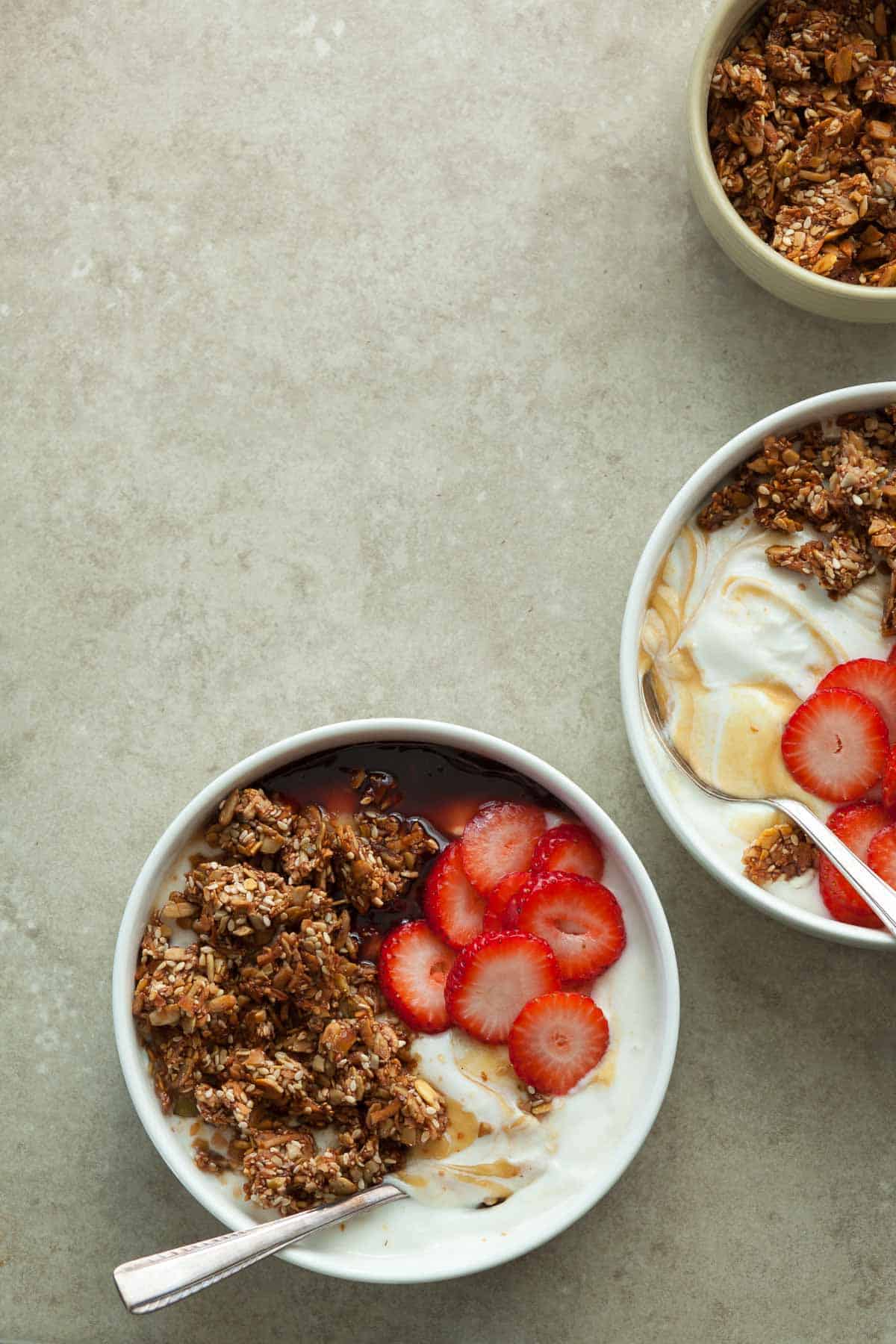 Nut-Free, Grain-Free Granola on Yogurt with Spoons