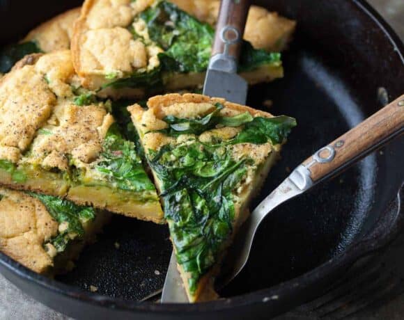 Spinach and Pea Pesto Socca/Farinata (Gluten-Free, Vegan) - A simple savory chickpea flatbread topped with a spinach pea pesto makes a great appetizer.