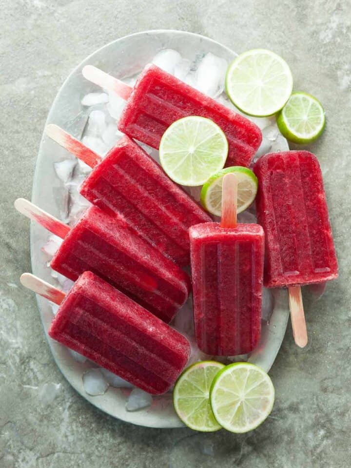 Cherry Lime Probiotic Popsicles - Tangy and sweet these cherry lime popsicles are a healthy and gut friendly warm weather treat.