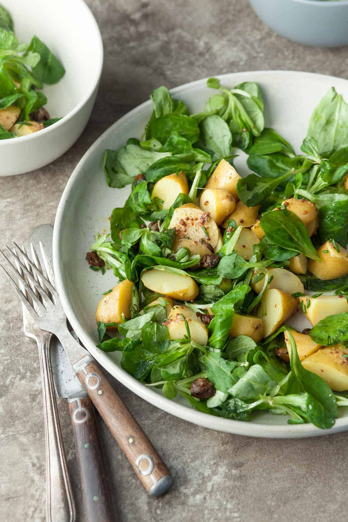 Mustard Potato Salad on Plate with Fork and Knife.