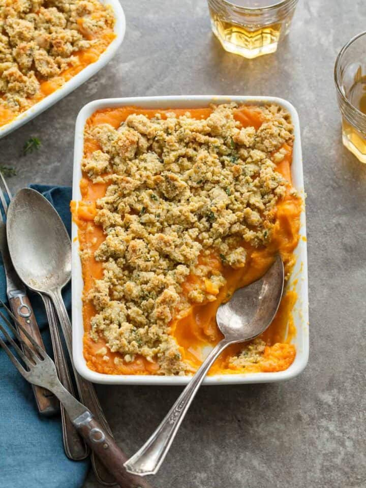 Sweet Potato Butternut Squash Gratin (Paleo, Vegan) - This thyme scented sweet potato and butternut squash gratin is a savory alternative to the usual sweet potato casserole this holiday season.