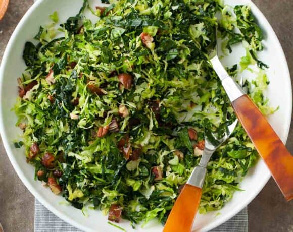 This shredded Brussels sprout and kale salad with maple-dijon dressing is a fresh, make-ahead alternative to heavier sides.