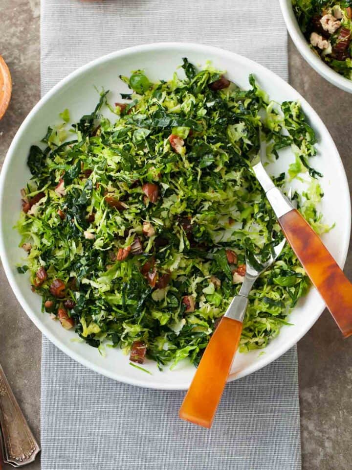 This shredded Brussels sprout and kale salad with maple-dijon dressing is a fresh, make-ahead alternative to heavier sides.