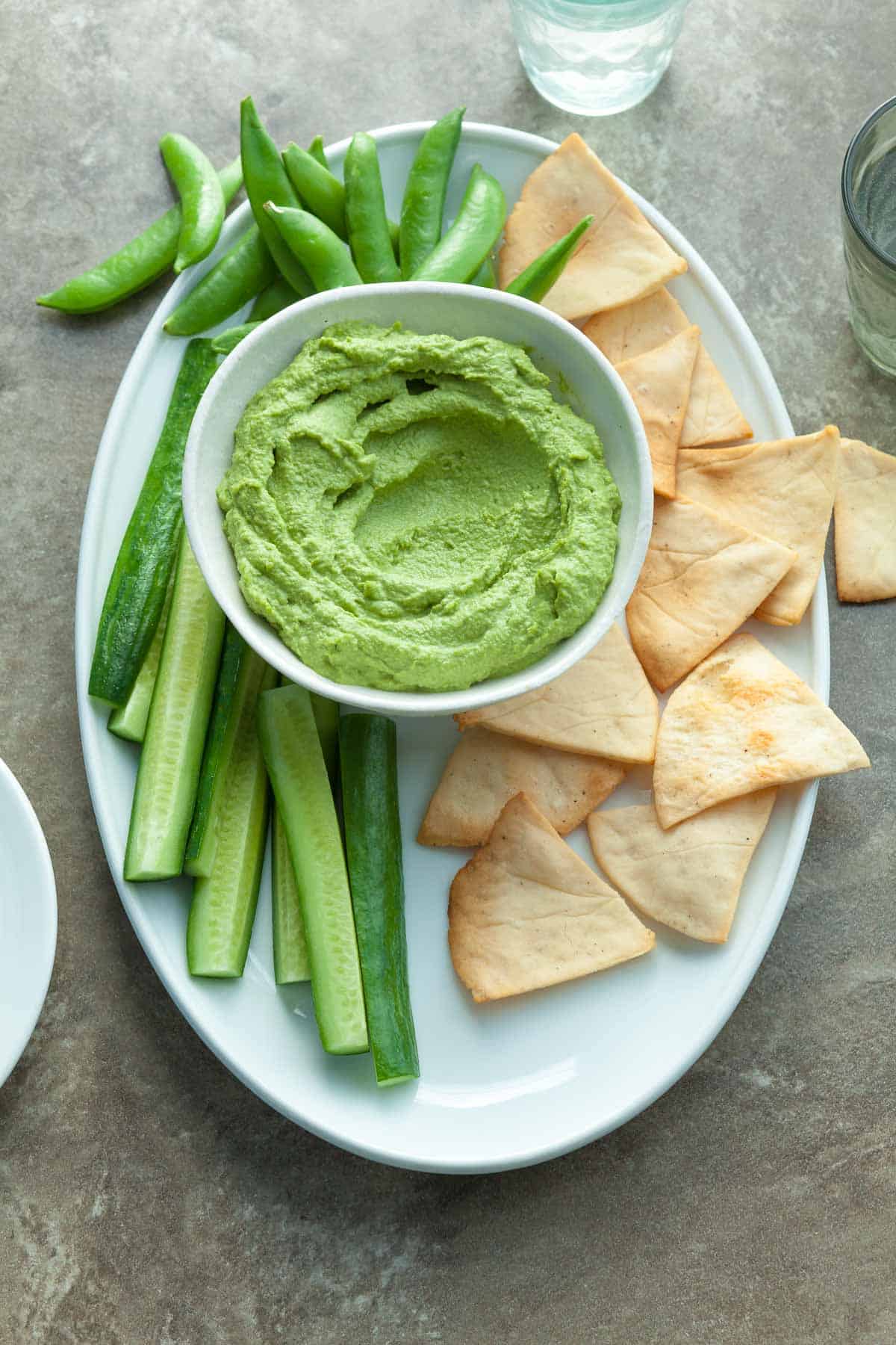 Paleo Almond Hummus on Serving Platter with Chips and Vegetables