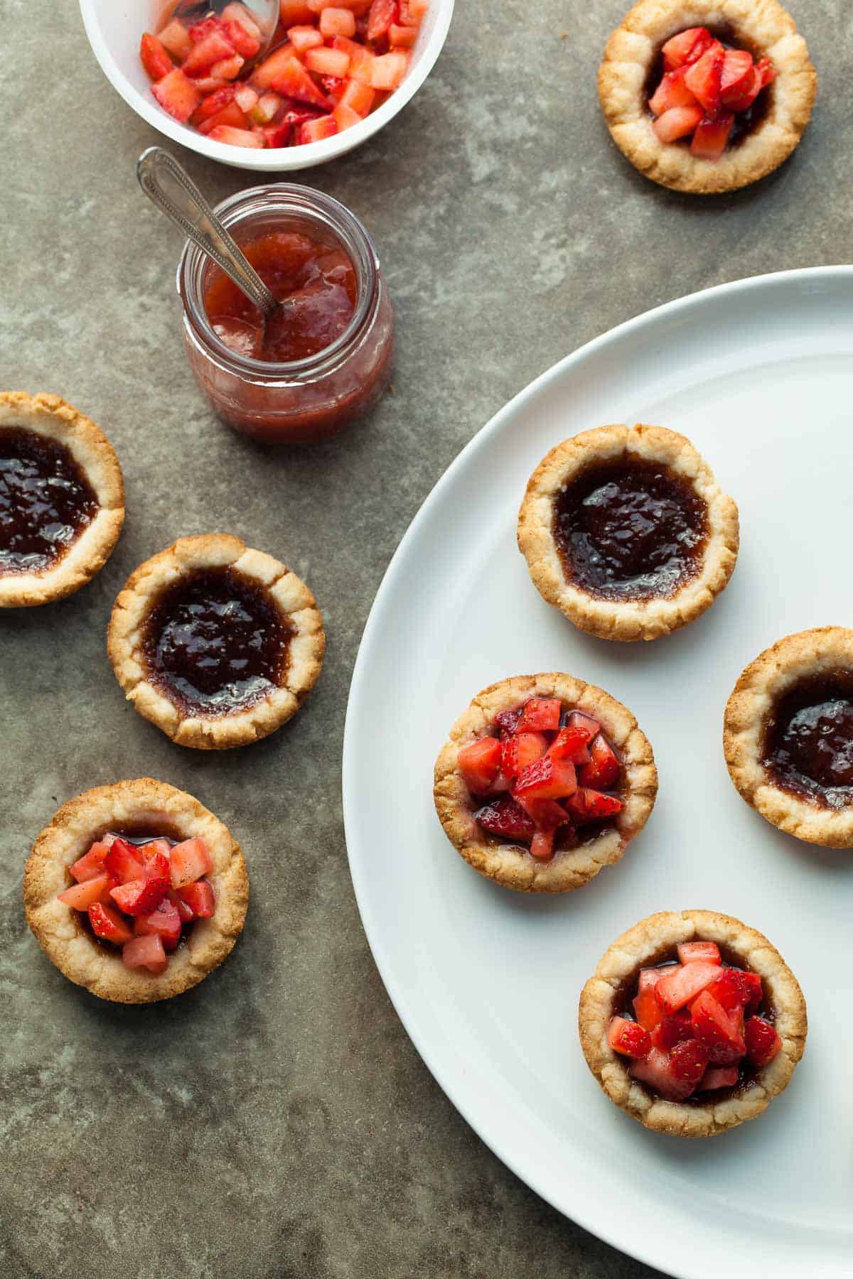 Gluten-Free Jam Tarts on Plate with Jar