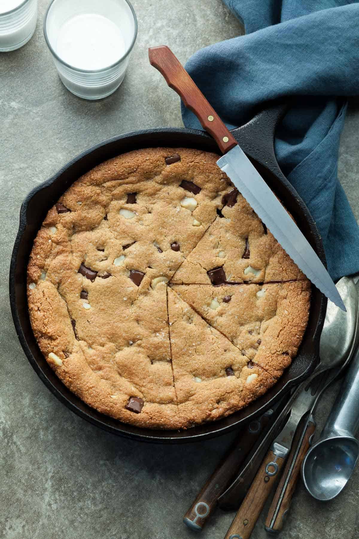 Gluten-Free Skillet Cookie in Skillet with Knife