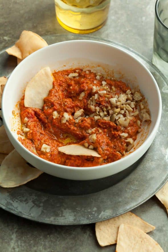 Roasted Red Pepper and Walnut Dip in Bowl with Chips