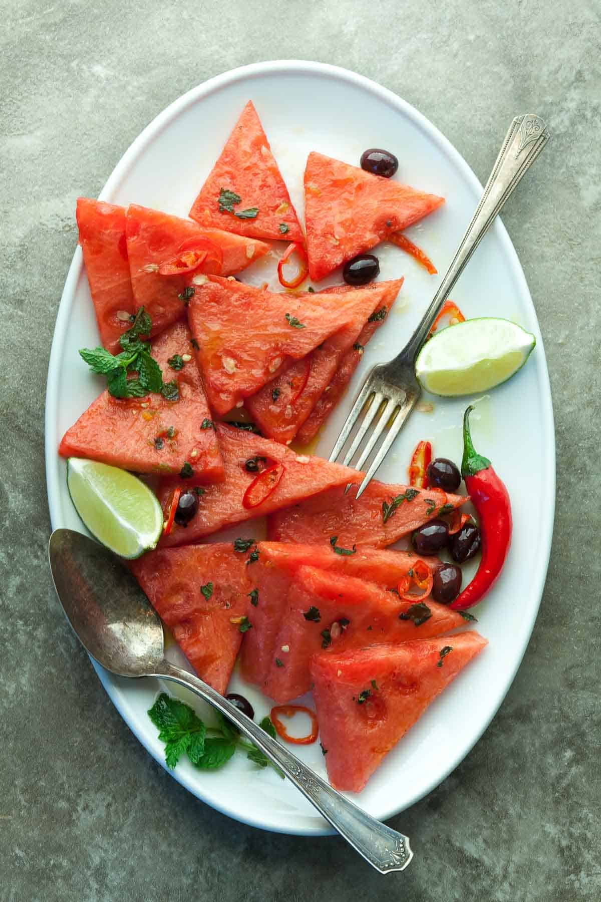 Watermelon Salad with Chili and Mint on Plate Top View