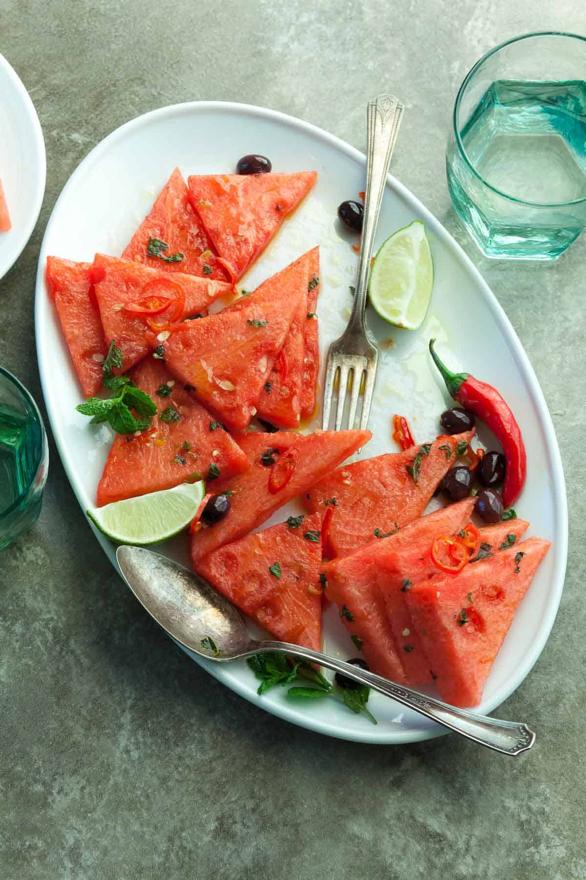 Spicy Watermelon Salad with Olives on Serving Plate