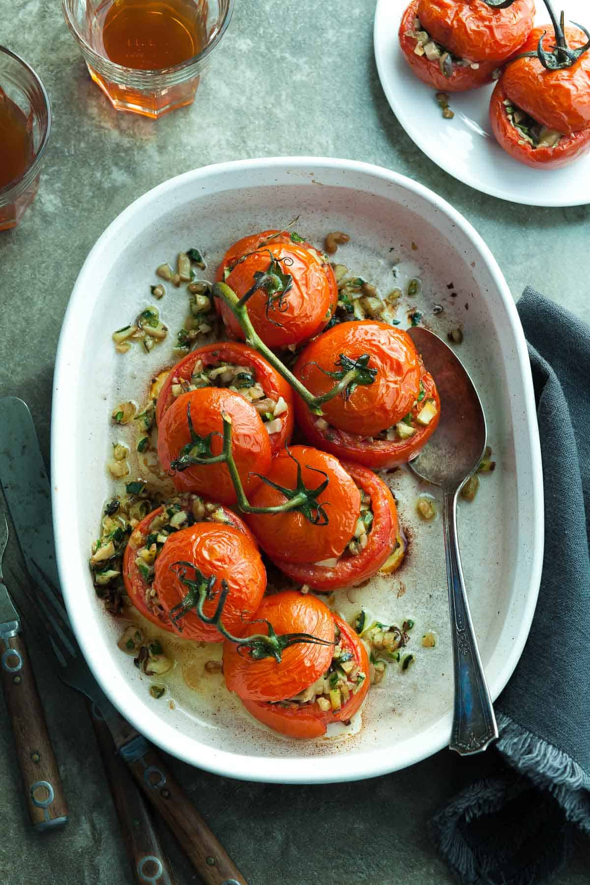 Zucchini and Mushroom Stuffed Tomatoes in Baking Dish