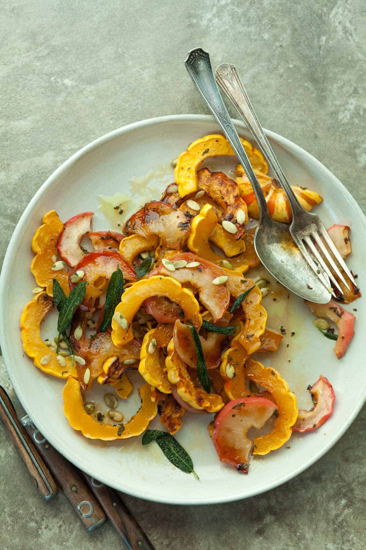 Roasted Delicata Squash on Plate with Serving Spoon