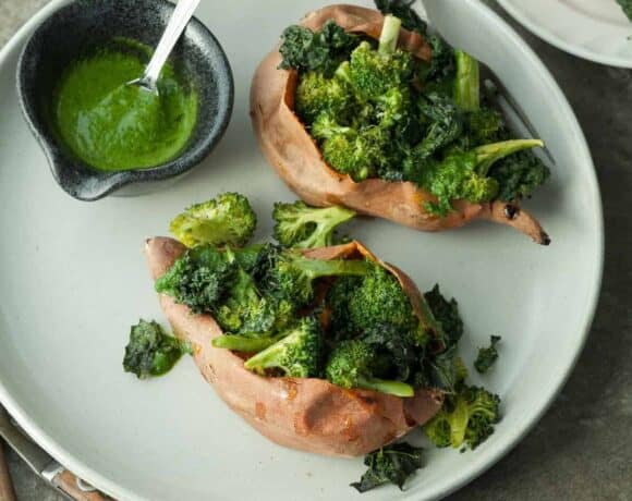 Baked Sweet Potatoes Stuffed with Roasted Broccoli and Green Tahini Sauce