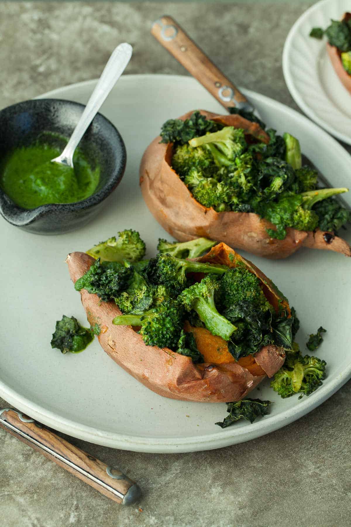 Broccoli Stuffed Sweet Potatoes with Sauce on Plate