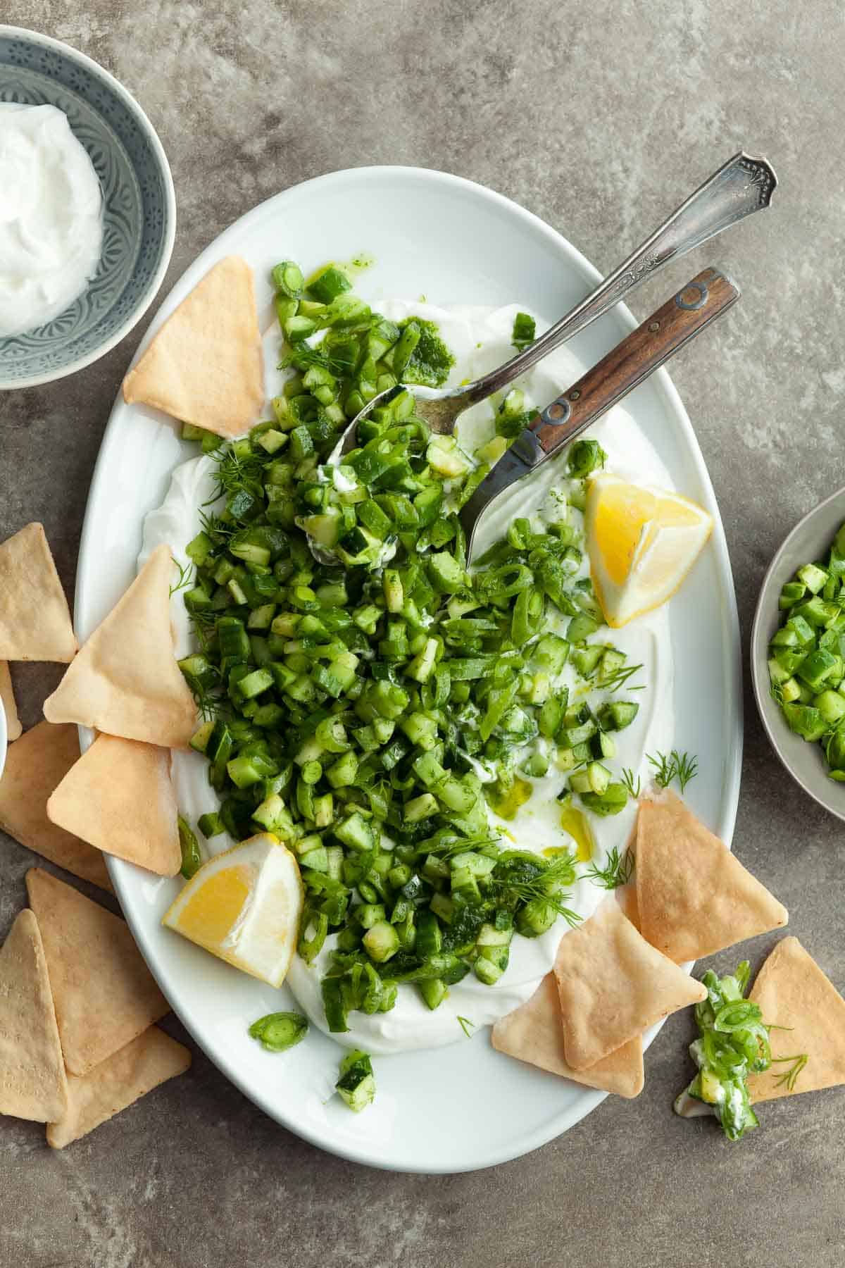 Zucchini and Cucumber Salad over Yogurt