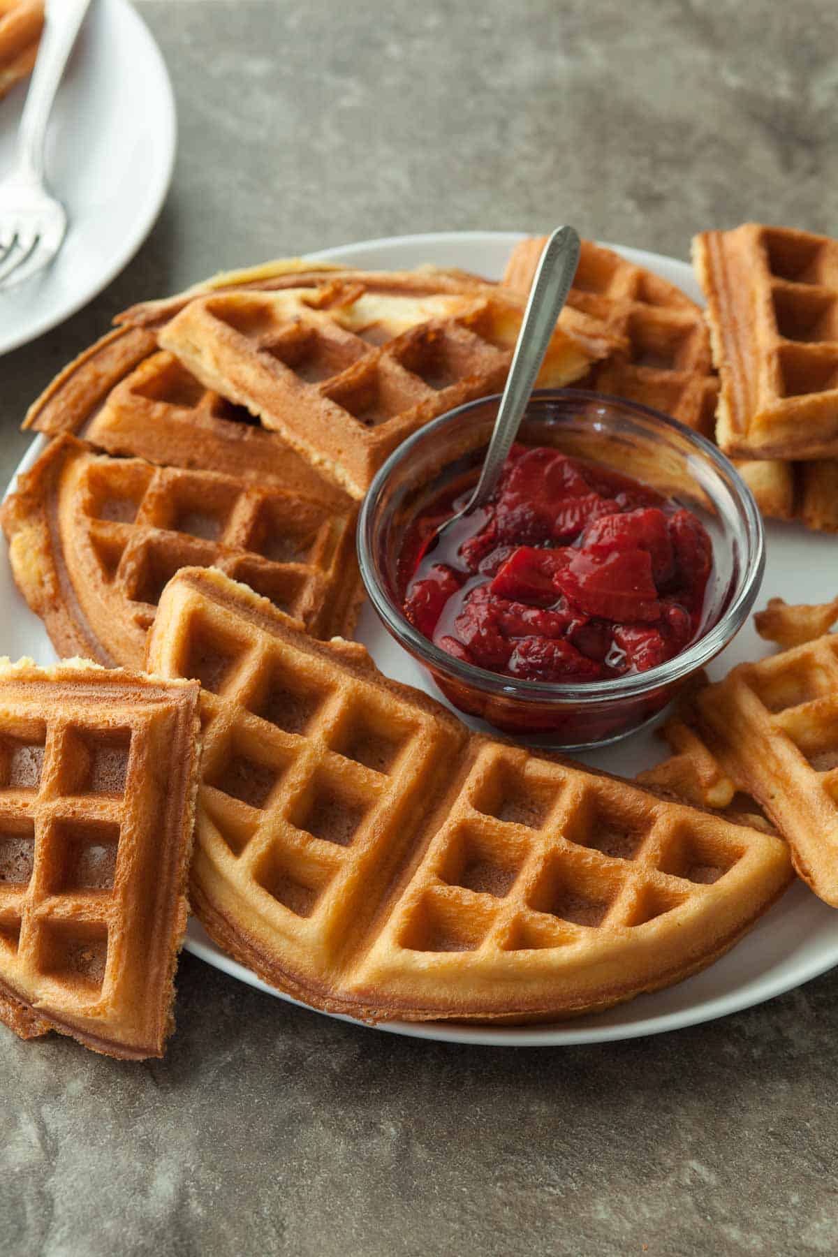 Blender Waffles with Strawberry Sauce on Serving Plate