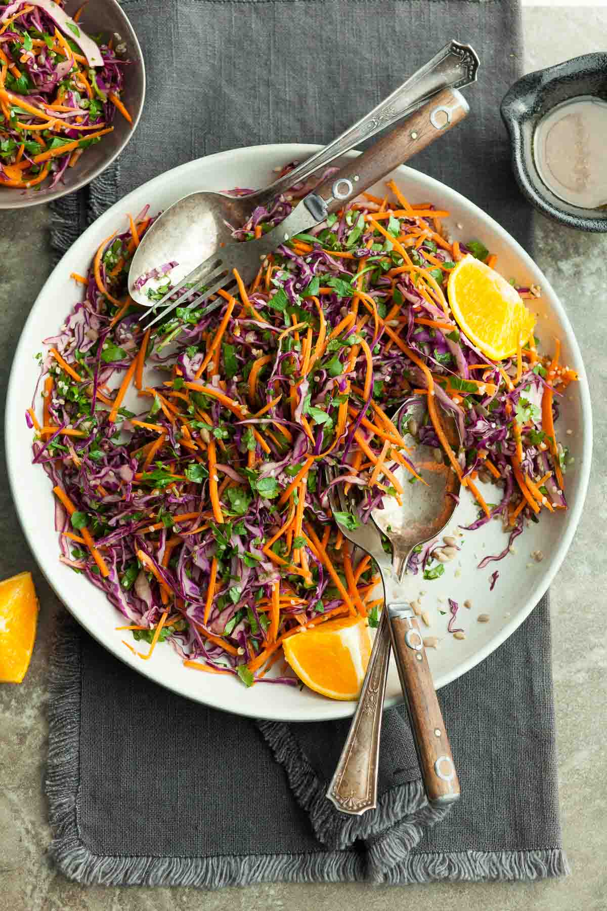 Red Cabbage and Carrot Slaw with Orange Sesame Dressing on Plate