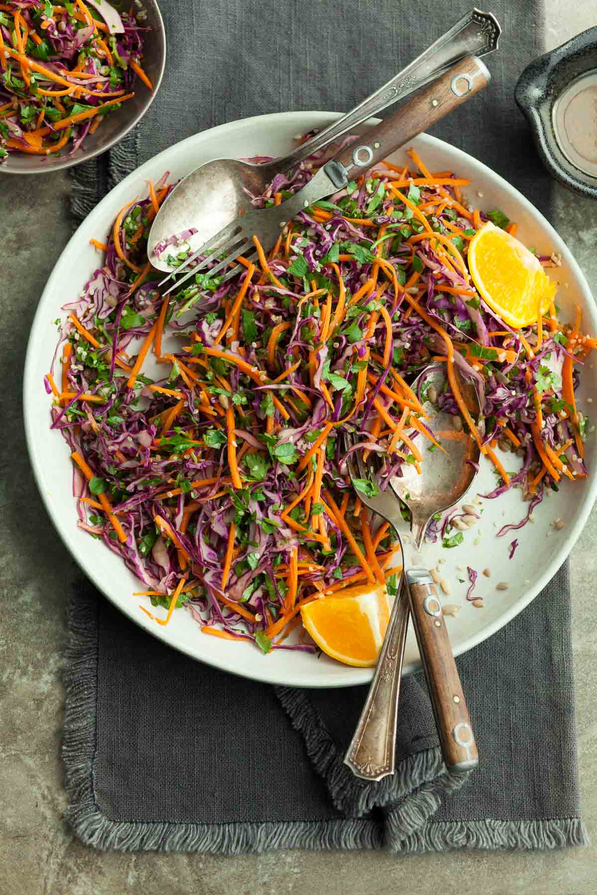 Healthy Slaw on Plate with Serving Spoons