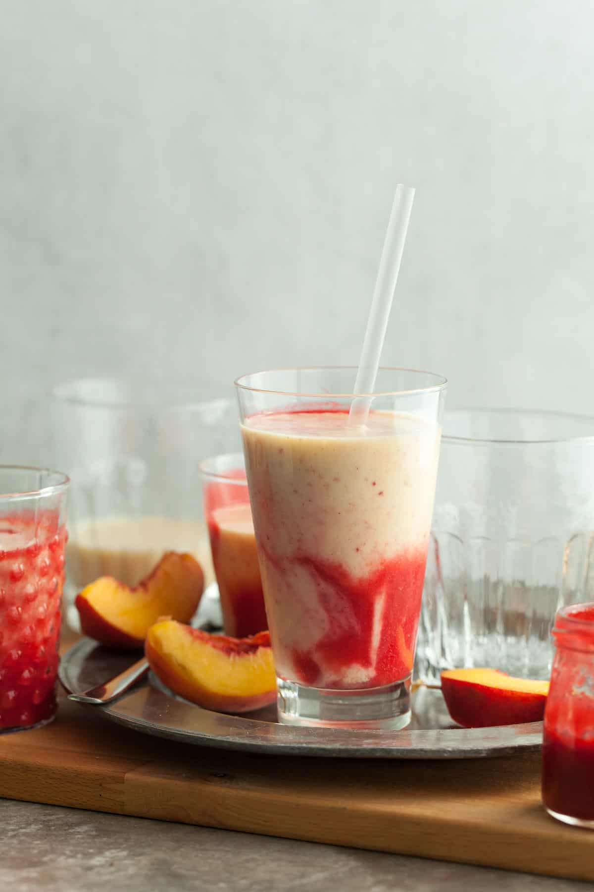 Peach Lassi in Tall Glass with Straw