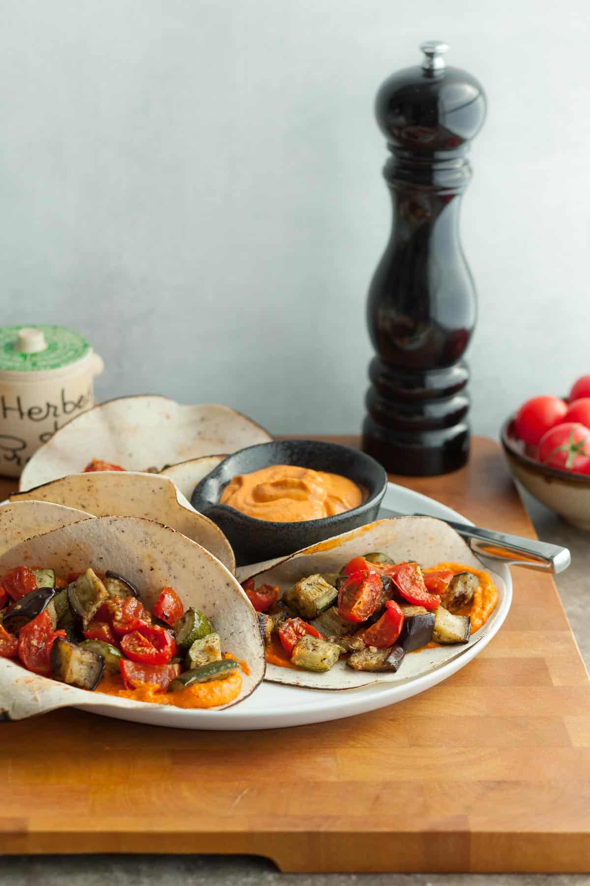 Roasted Veggie Wraps with Sauce on Plate