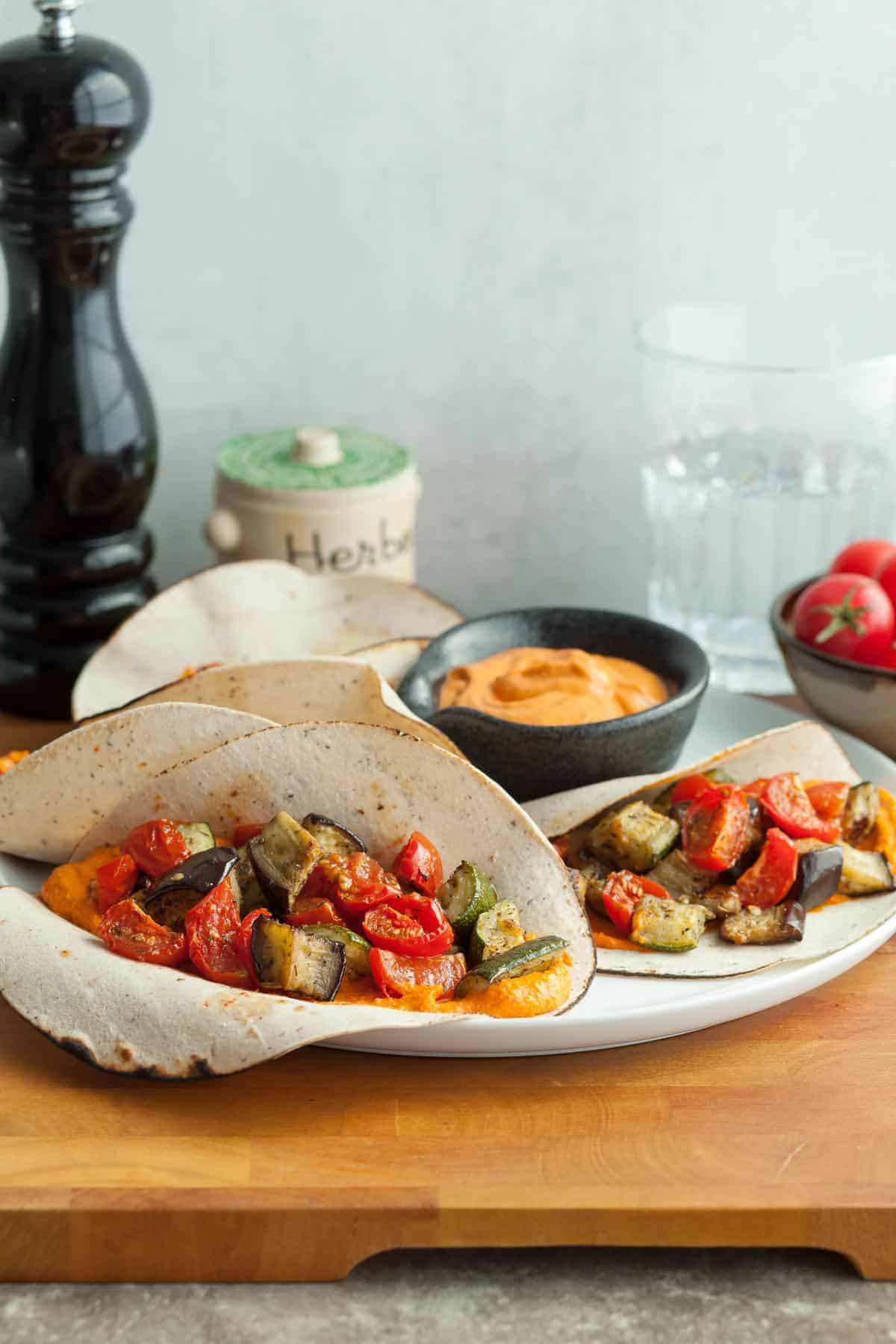 Roasted Vegetable Wraps on Plate with Sauce