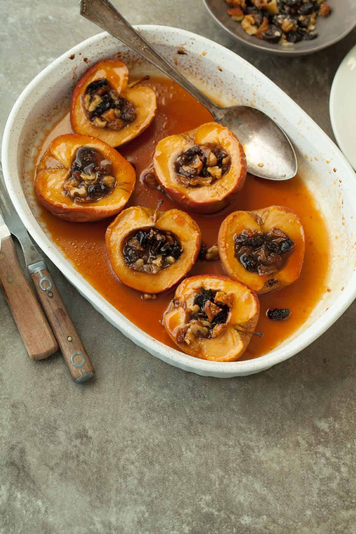 Healthy Baked Apples in Baking Dish with Spoon