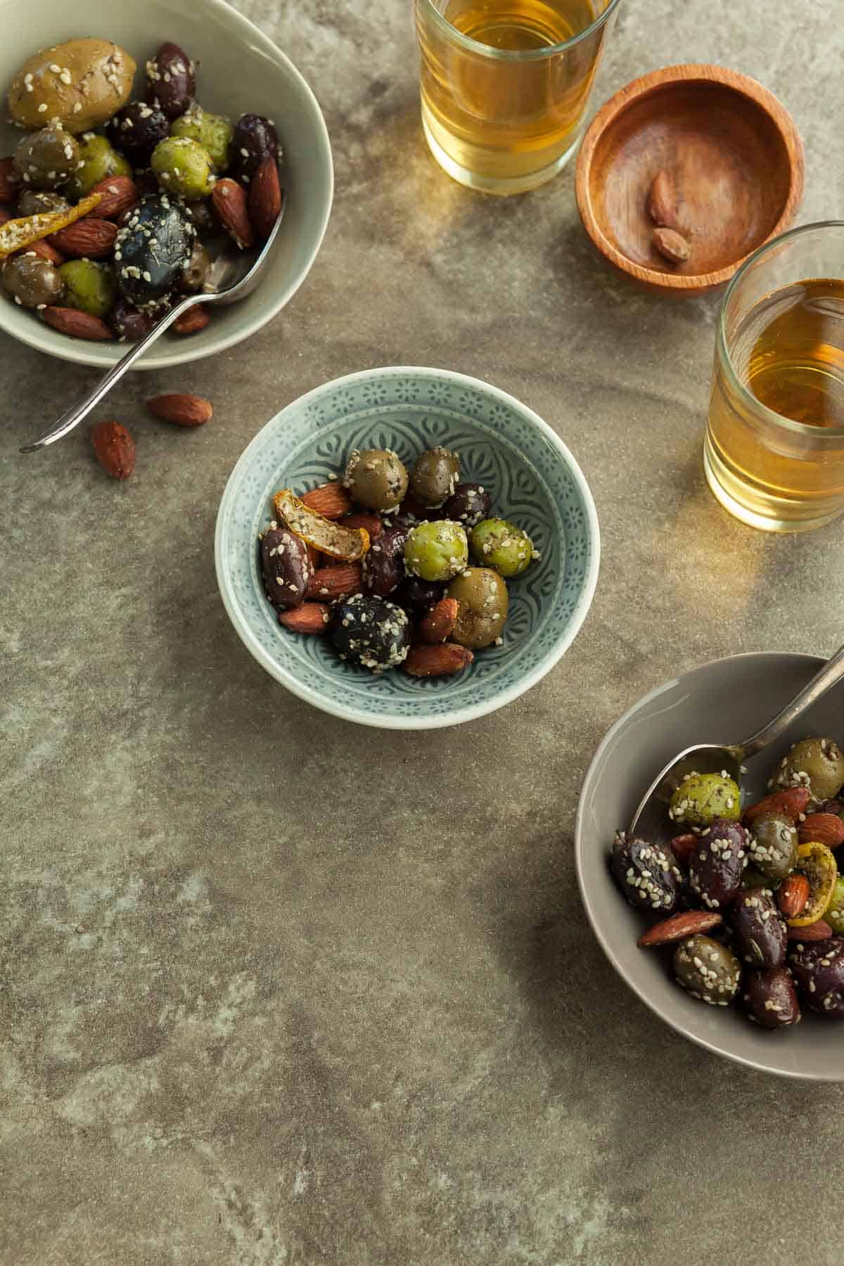 Warm Olives in Bowls with Spoon