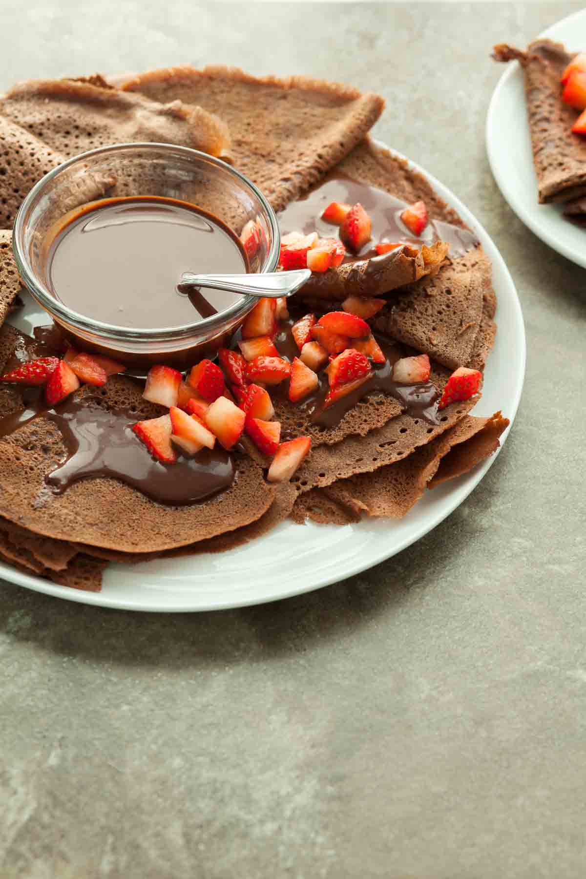 Chocolate Crêpes with Chocolate Sauce on Plate