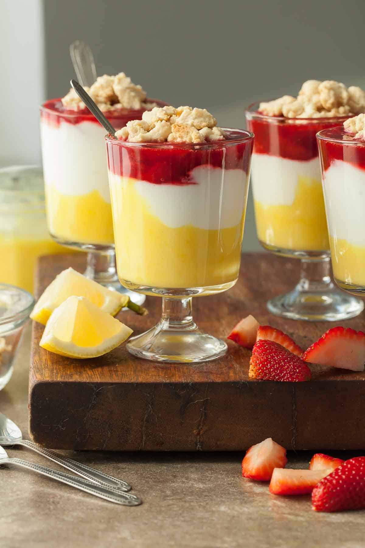 Lemon Berry Yogurt Parfaits in Dessert Glasses with Spoons