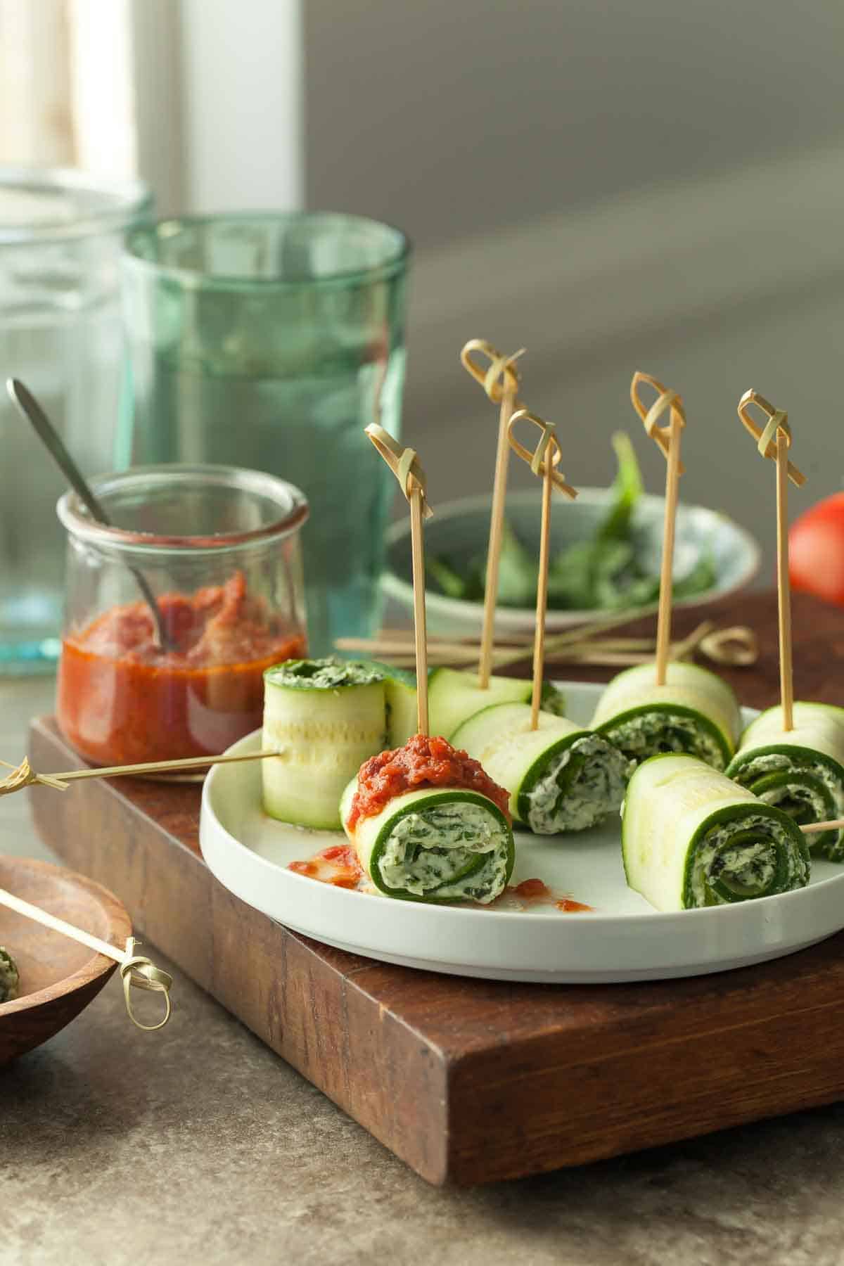 Zucchini Roll Ups with Marinara Sauce on Plate