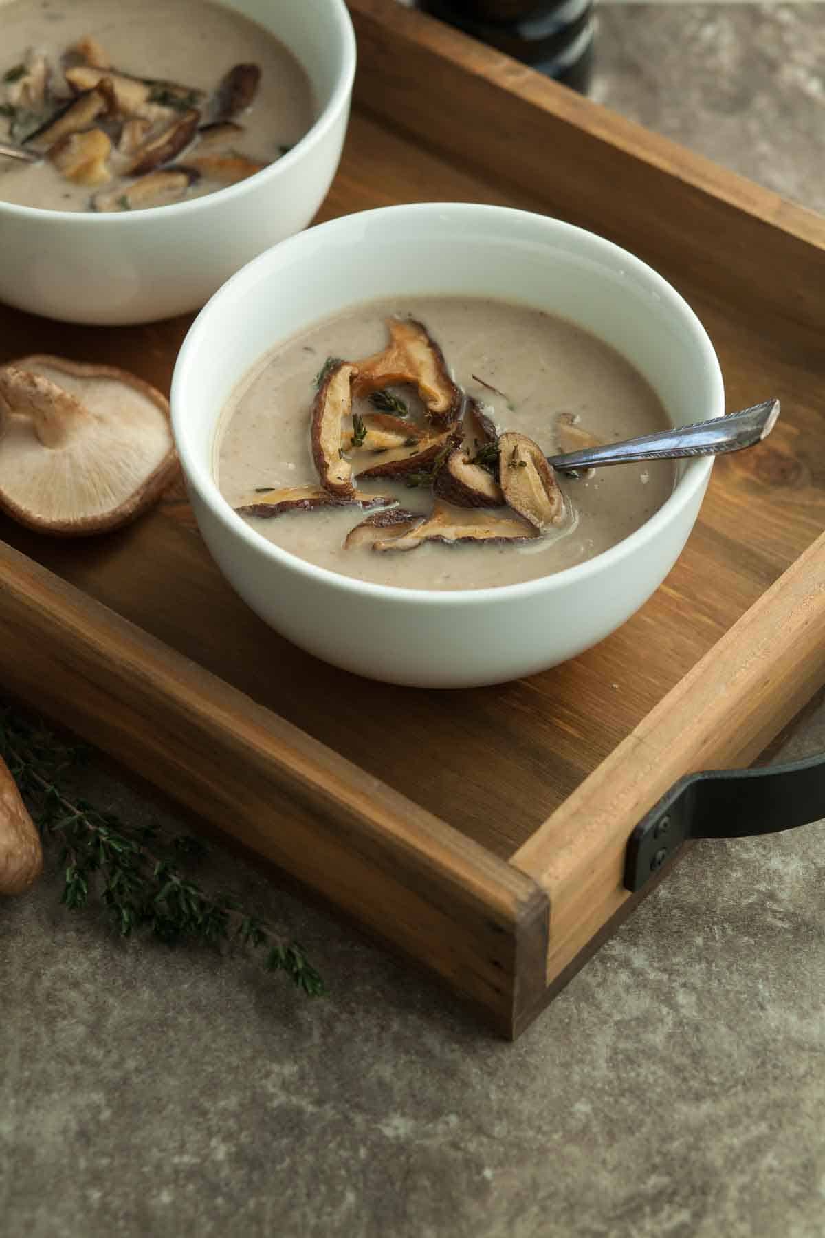Vegan Mushroom Soup in Bowl Topped with Mushrooms