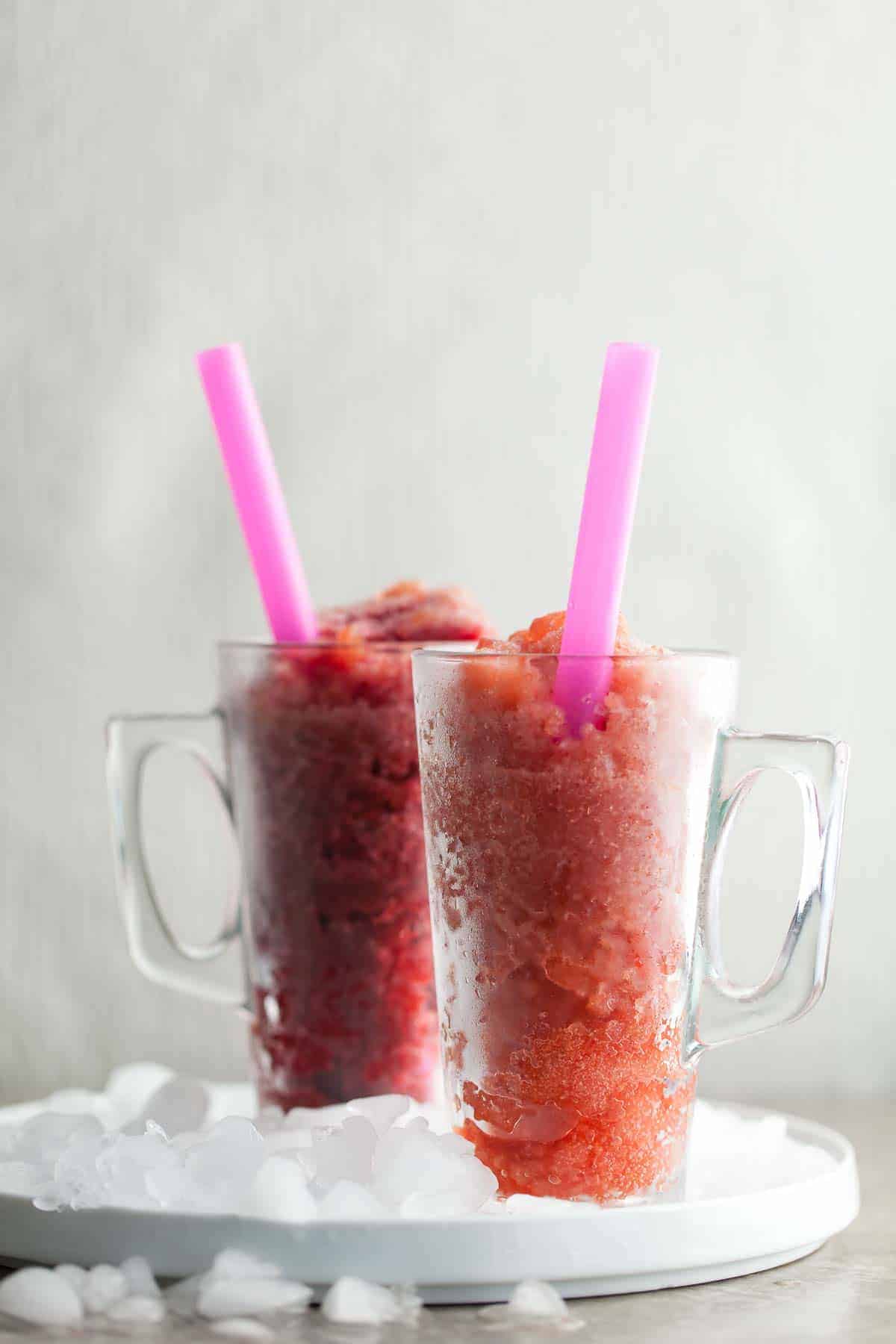 Kombucha Juice Slushies in tall glasses with straws