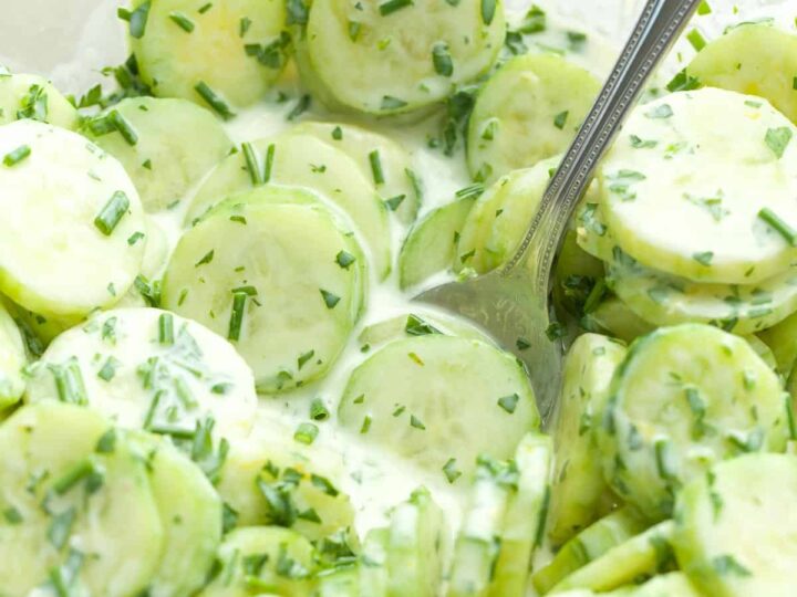 Creamy Cucumber Salad in bowl with spoon
