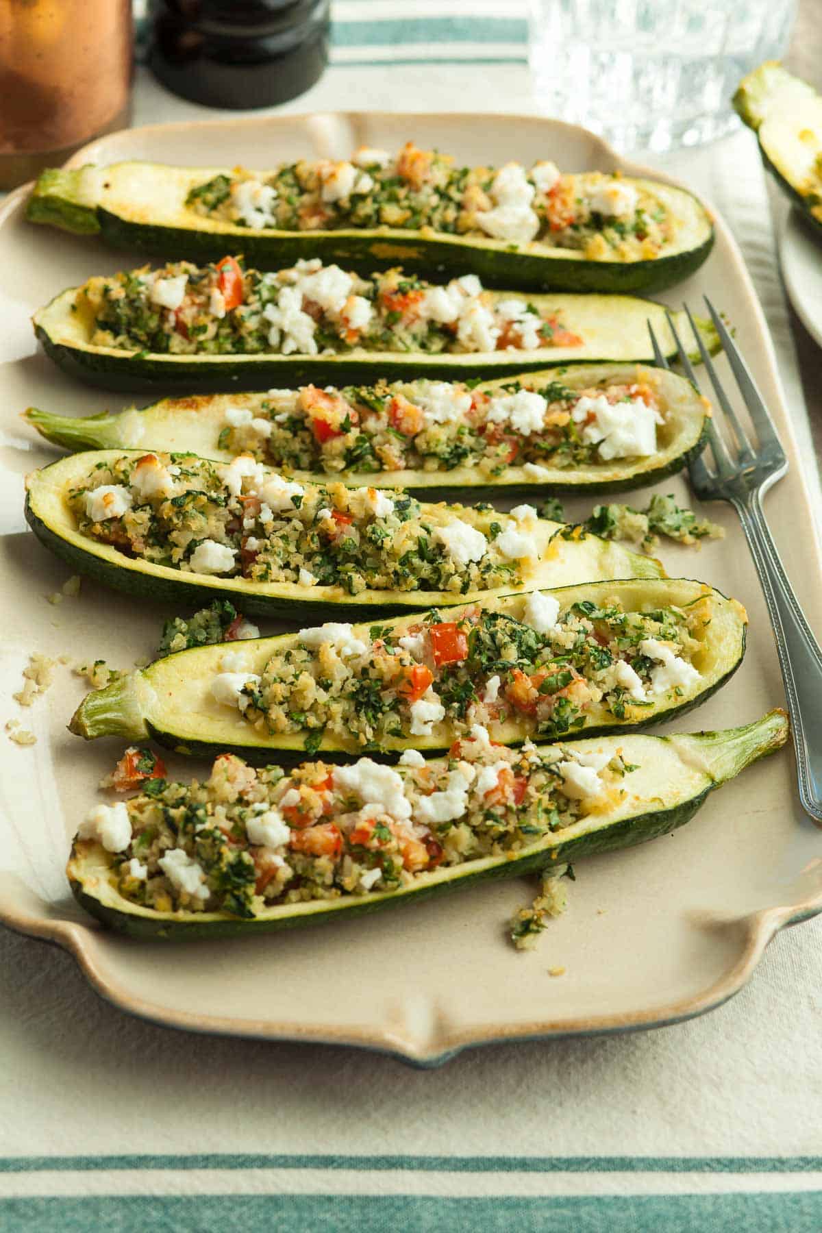 Vegetarian Zucchini Boats on Platter with Fork